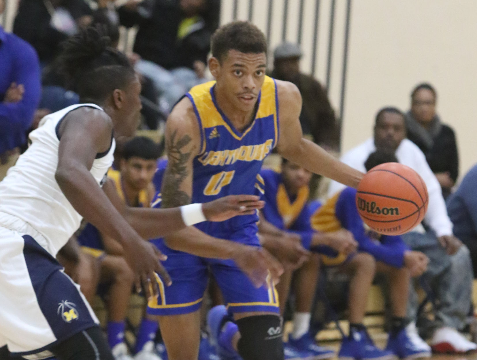 Lighthouse at Marquette Catholic boys basketball